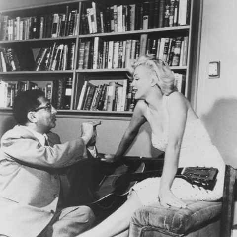 Sidney Skolsky and Marilyn Monroe in her Doheny Drive apartment in Hollywood. Photo by Bob Beerman.