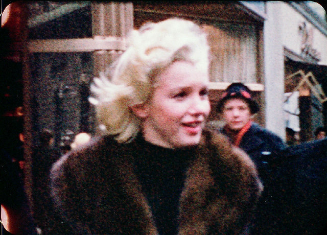 A candid image of Marilyn on the streets in New York City, 1955. Copyright Peter Mangone.